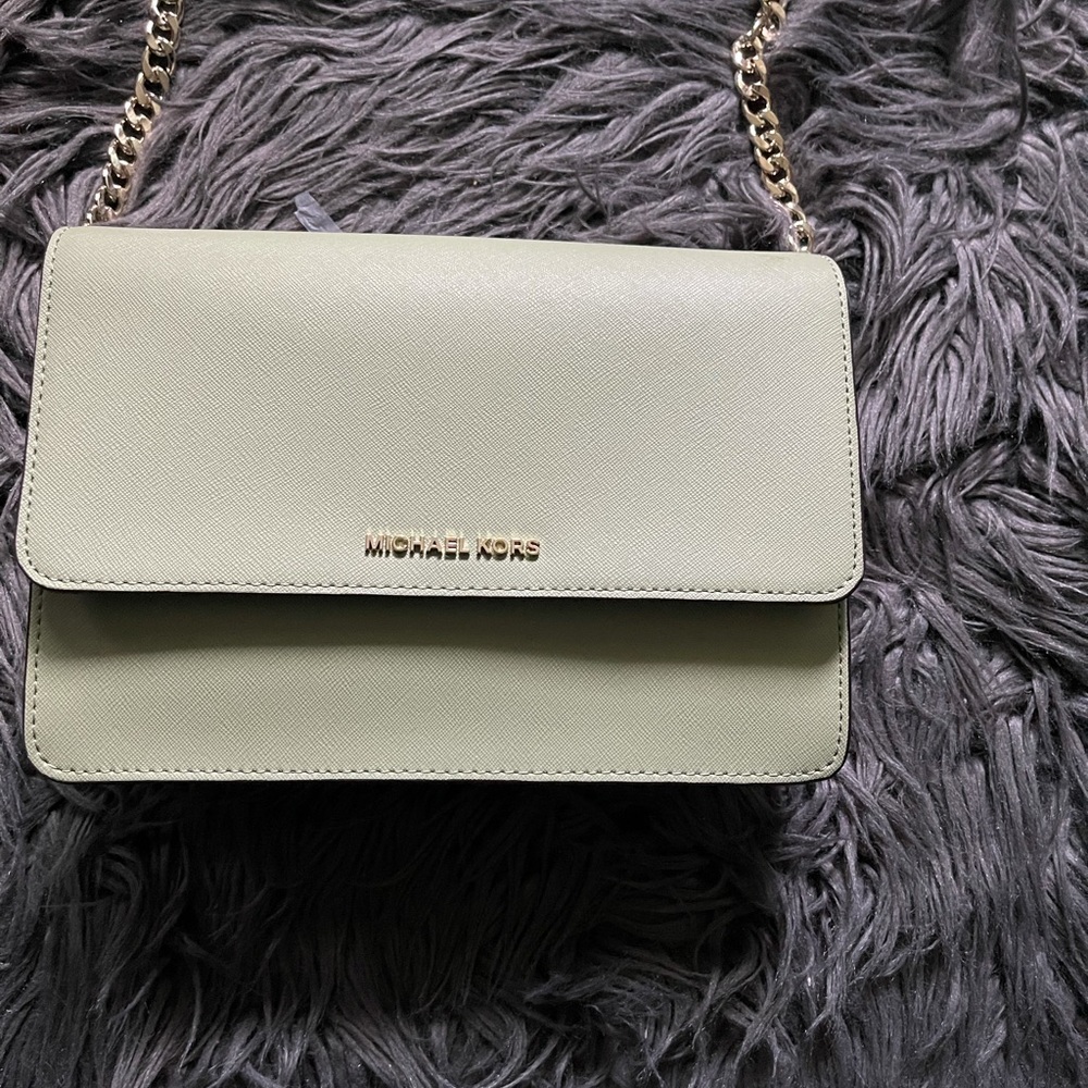Michael Kors crossbody bag 7.5”by11”